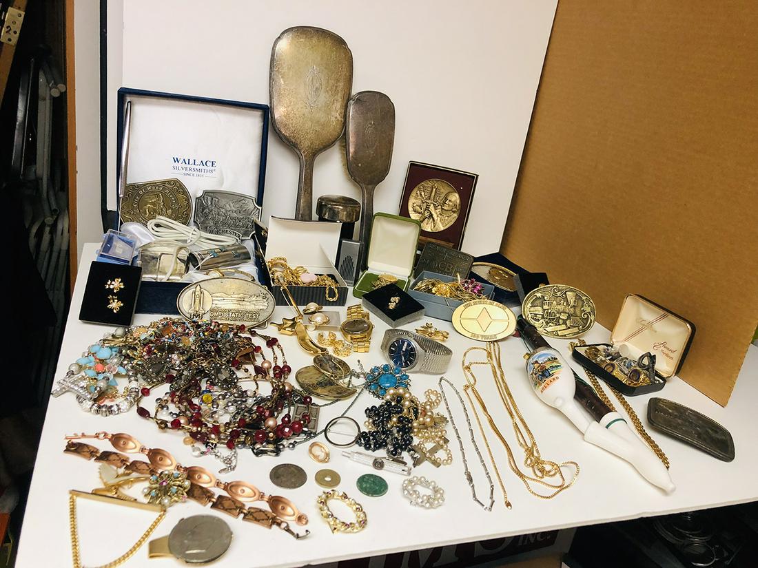 Estate Jewerly Treasure Trove: Estate jewelry treasure trove includes beads, watches, pins, cameo, tie clips, dresser hand mirrors, belt buckles including Winchester, etc.