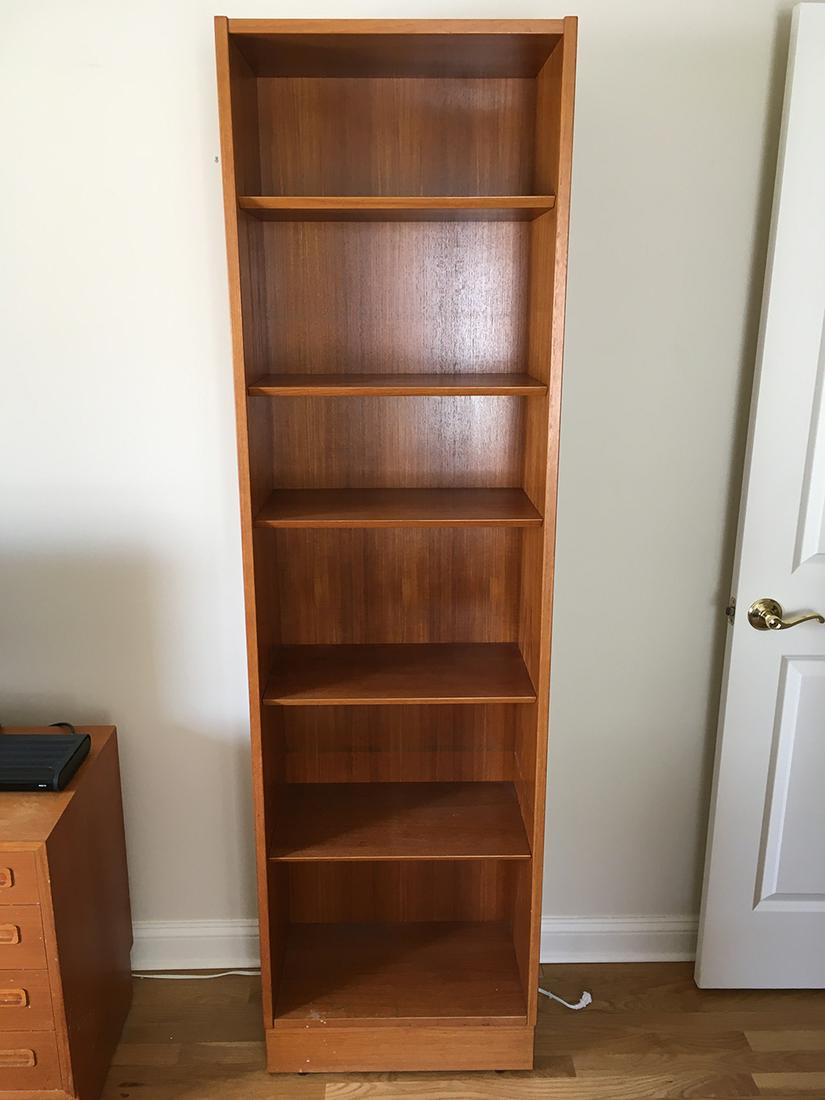Mid-Century Danish, Hundevad, Bookcase: Mid-Century Danish, Hundevad narrow 5 shelf bookcase, measures aprox. 21.75 inches x 12 inches x 68.75 inches.