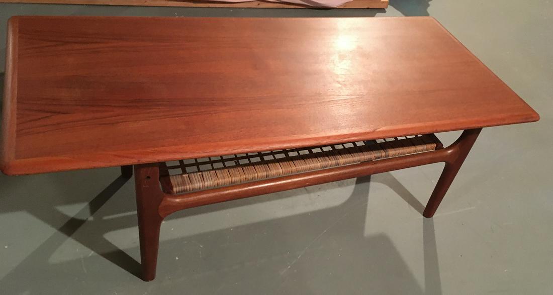 Mid-Century Modern Coffee Table: Mid-Centry modern coffee table with caned shelf, measures approx. 47 inches x 20.5 inches x 17 inches.