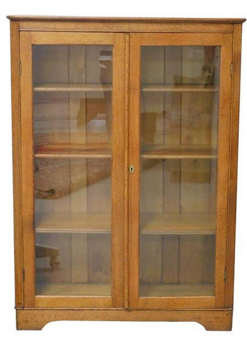 Larkin 2 Door Oak Bookcase: Larkin 2 Door oak bookcase. Made by Larkin Soap Co., with 3 adjustable shelves. This bookcase has been totally refinished and is ready to be brought right into your home. Can also be used as a collect