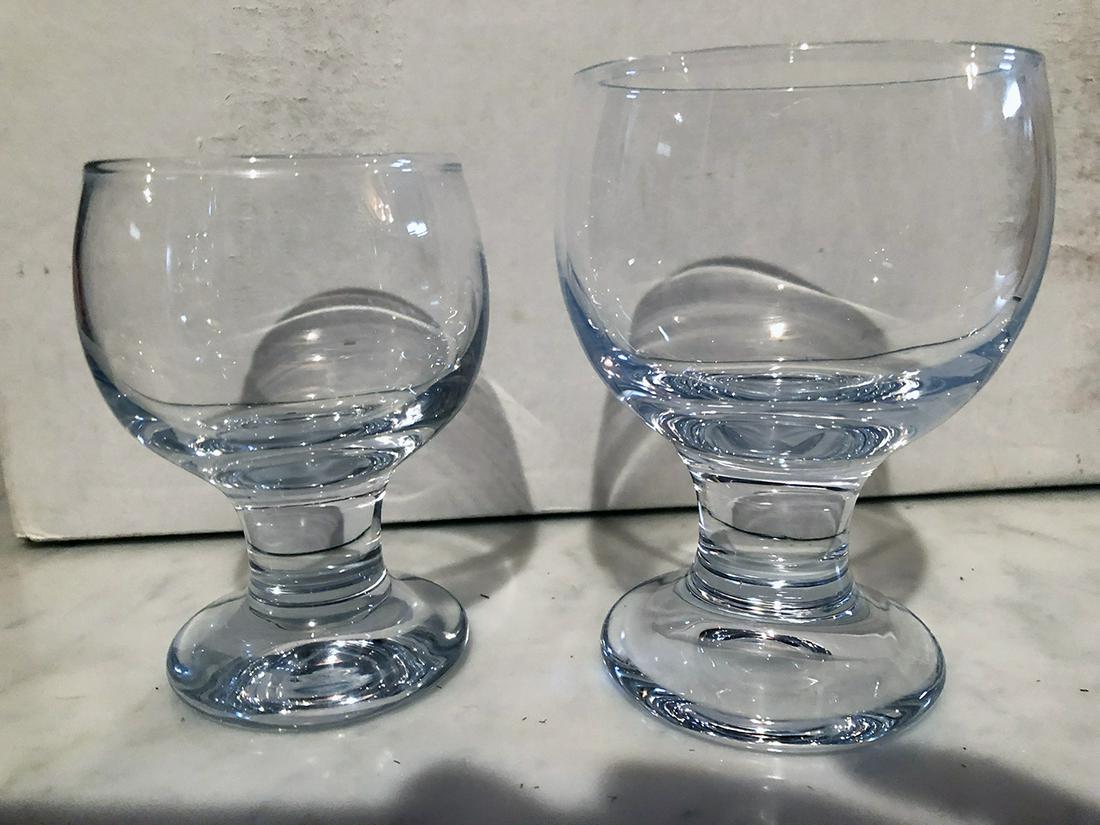 Holmegaard, Denmark Crystal: Holmgaard, Denmark Crystal includes 18 crystal footed goblets and 18 crystal footed wine glasses.