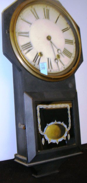 Terry Clock Co Oct. Top Drop No 61 Mdl. Wall Clock: Terry Clock Co., Bristol, CT Circa 1875 Octagon Top Drop No. 61 Model Wall Clock. As shown in 1875 Terry Clock Co. catalog. 8-day brass time strike movement, cast iron case, 19 inches tall with octogo