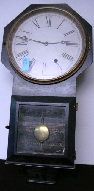 Terry Clock Co. Octagon Top Drop No 61 Model Wall: Terry Clock Co. Waterbury, CT, Circa 1875, Octagon Top Drop No 61 Model Wall Clock, as shown in 1875 Terry Clock Co. catalog. 8-day brass time movement (winds at 5), iron case, 19 inches tall with oct