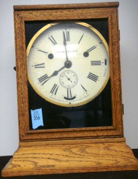 Seth Thomas Clock Co. "Wardroom" Wall Clock: Seth Thomas Clock Co. Thomaston, CT, Circa 1880 porcelain dial movement from "Wardroom" model ships bell Wall Clock, 30 hour bell ships bell striking movement, 10 inches by 4 inches by 12 inches.