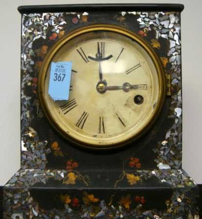Terry and Andrews Small Cast Iron Shelf Clock: Terry and Andrews, Bristol, CT, Circa 1850, Small Cast Iron Shelf Clock, with mother of pearl and painted gilt decoration. Only 8.5 inches tall, 8-day balance escapement movement marked Terry and Andr