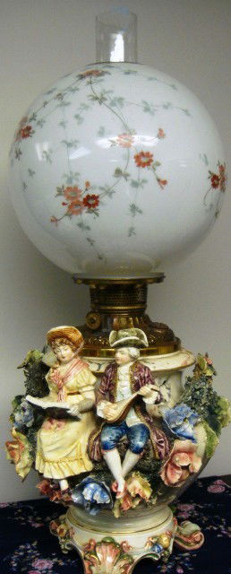 Antique Oil Lamp with Musical Figures all Orig.: Antique Oil Lamp with Musical Figures all Original in Oil. Measure to top of ball shade 23 in. tall, to top of burner is approx. 12 1/2 inches tall. This is a fabulous lamp.