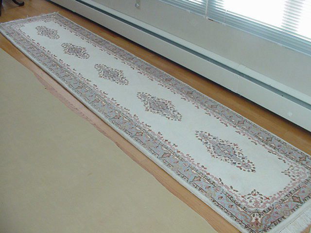 Indo Kirman Runner 2' 6" x 11' 9": Indo Kirman Runner 2' 6" x 11' 9". Rugs have been in private home, lady had purchased rugs and paid tremendous amount of retail money for them. Now in her 80's, she is downsizing and can't take them,