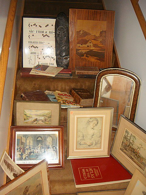 Estate Lot: Estate Lot including two 3 framed fox hunt prints, carved wooden tribal mask, inlaid marquetry wall hanging, 12 misc. books, water color signed E.A. Cox, framed "The Trail and Sentence of Christ". Nic