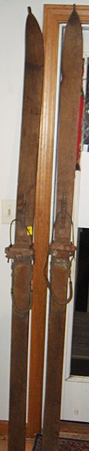 Pr. Of Early Wooden Skis: Pair of early wooden skis, great for an Adirondack cabin. Original finish, right out of the attic! Measure 83 inches long.
