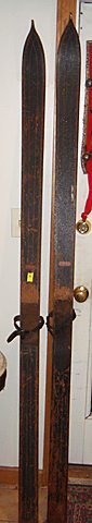 Vintage Pr. Of Early Wooden Skis: Vintage pair of early wooden skis, made by Viking, in U.S.A. Have great old finish on them. Original finish, right out of the attic! This pair measures 77 inches long. Would make an excellent decorati