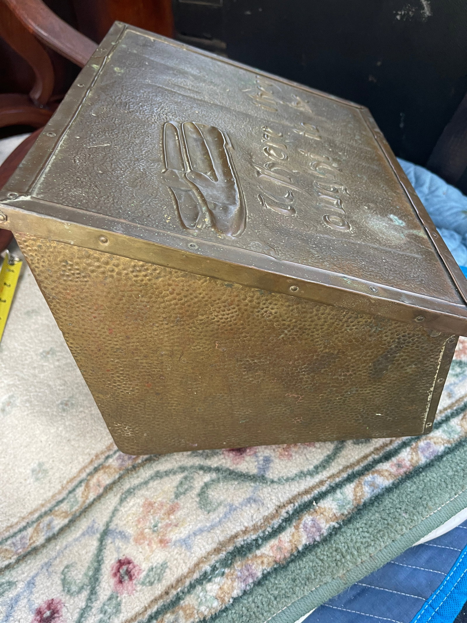 Brass Slipper Box: Brass Slipper Box, early 20th C., with an image of loafers and the slogan "Where They Ought To Be" on hinged lid, wear consistent with age and use.