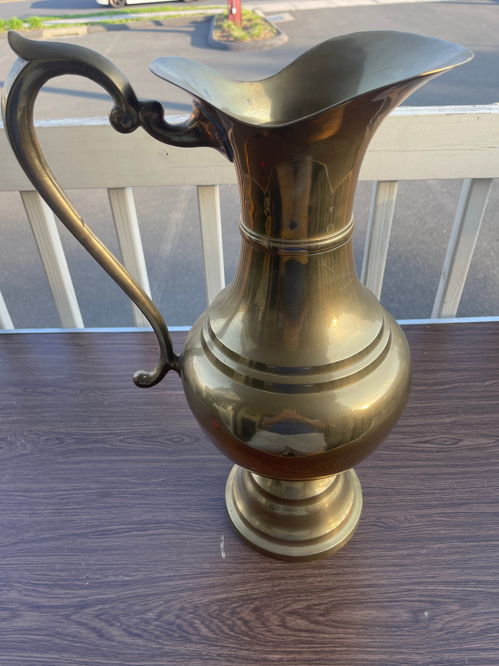 Brass Water Pitcher: This is a vintage brass water pitcher in excellent condition.
