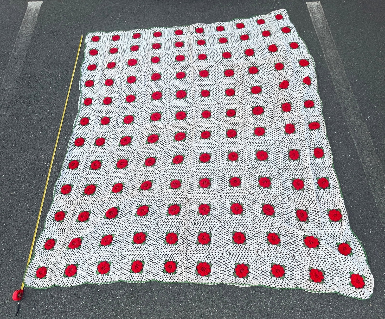 Handmade BlanketEstate Lot: This lot contains a handmade quilt and a handmade floral afghan in excellent condition.