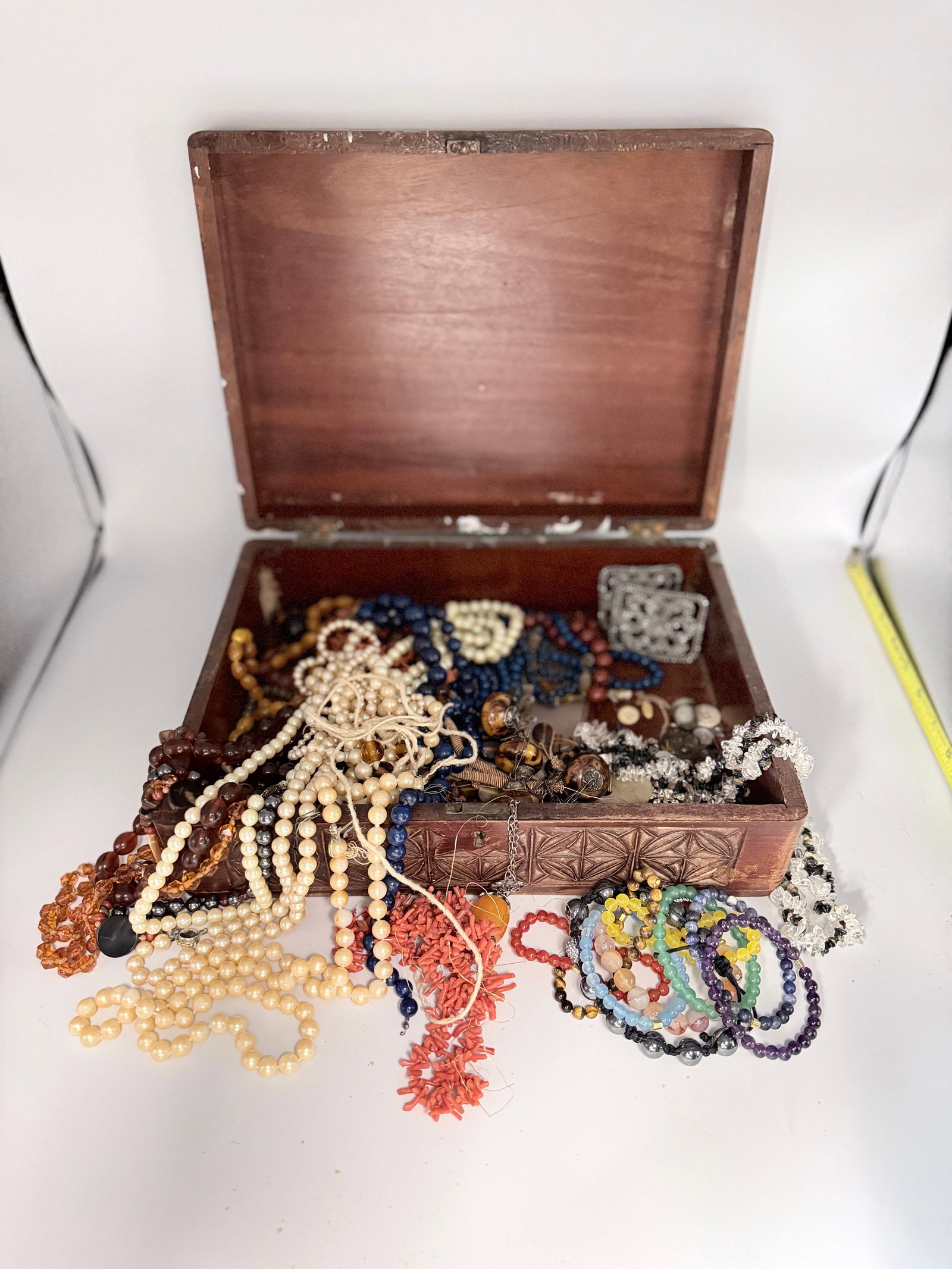 Estate Treasures with beads and bracelets: This is an estate treasutre box with all of the original owners favorite beads and bracelets. I'm sure you'll find some real treasures in here as she has collected for many years.