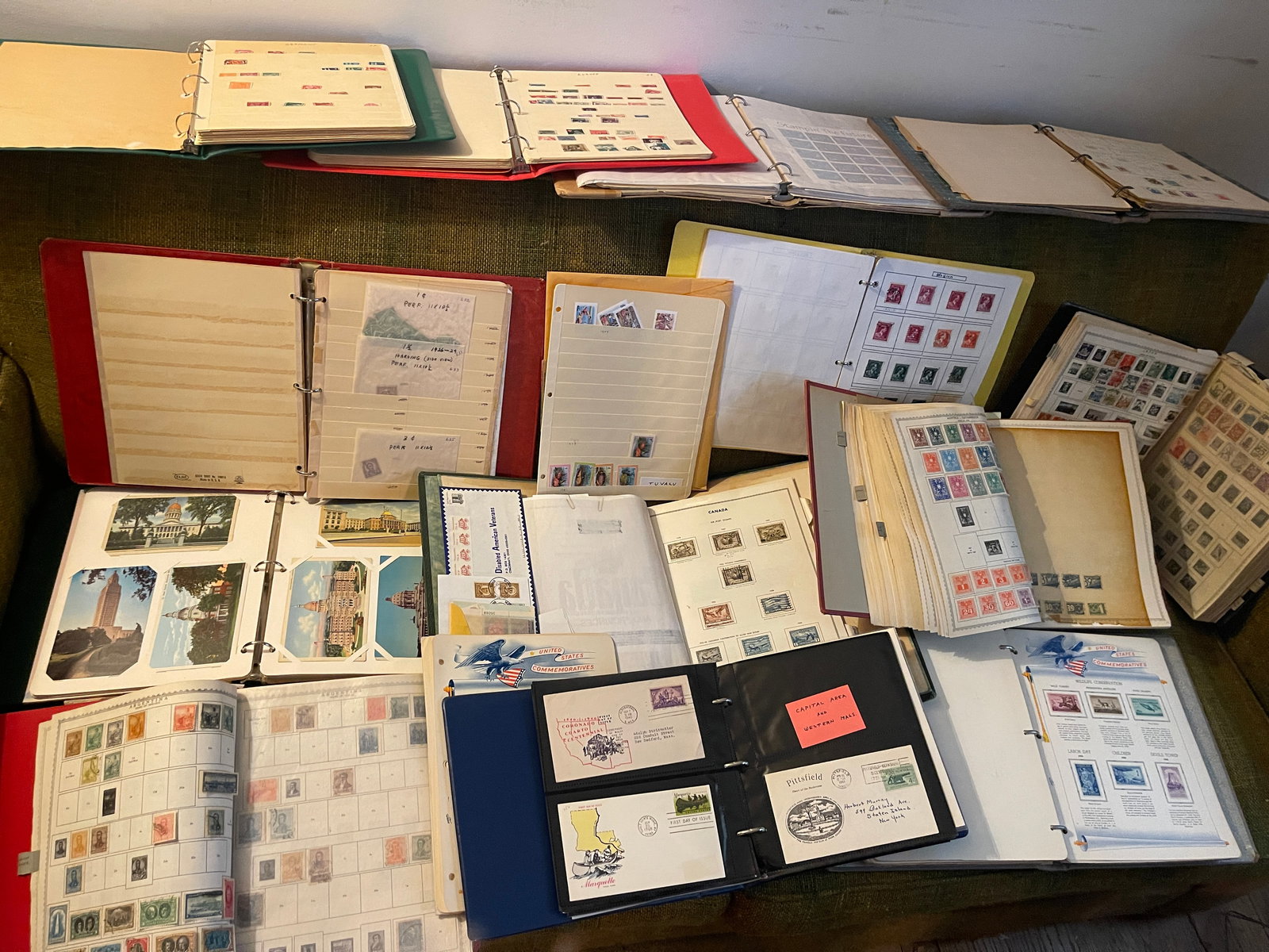 Extensive Stamp Collection: This is an extensive collection of stamps from around the world that was collected over 60 years. It includes albums, files, first day covers, postcards, boxes, etc.This is a huge collection that is