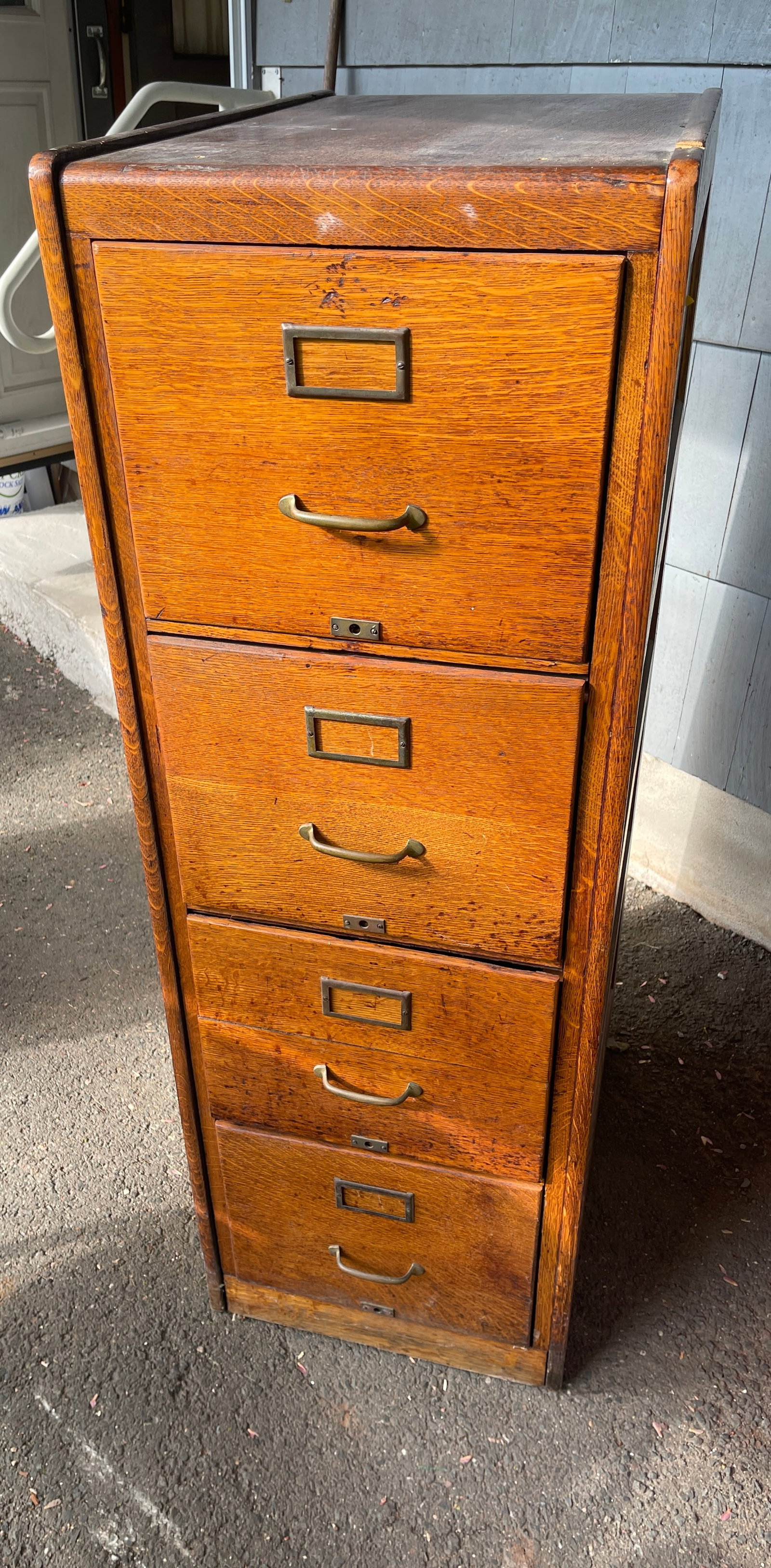 Oak 4-drawer Legal Filing Cabinet: This oak 4-drawer Legal filing cabinet still has its original finish.