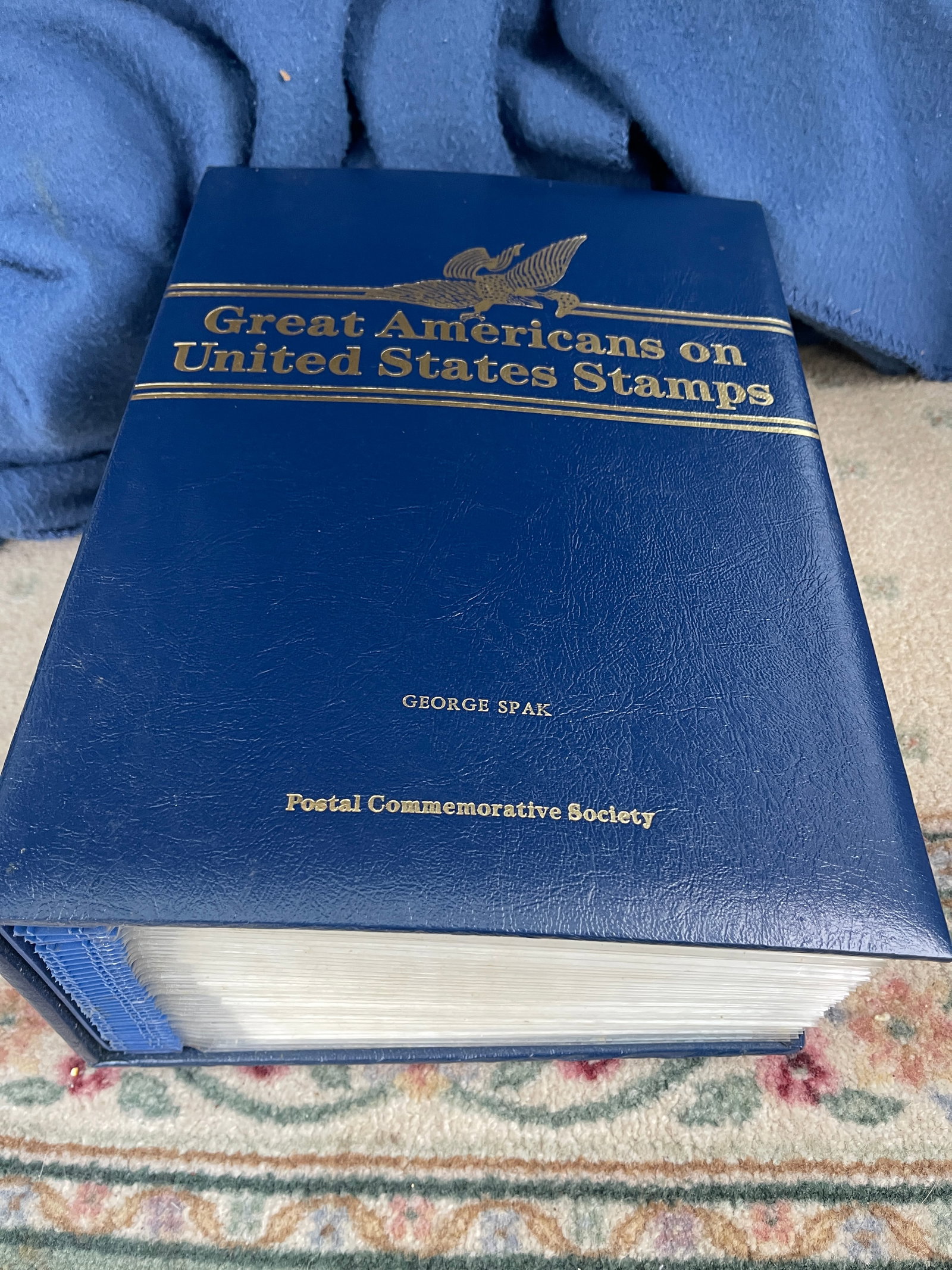 Great Americans on United States Stamp Collection: This lot contains a binder of mint-condition historic stamps matched with their exact replicas in 22kt gold.
