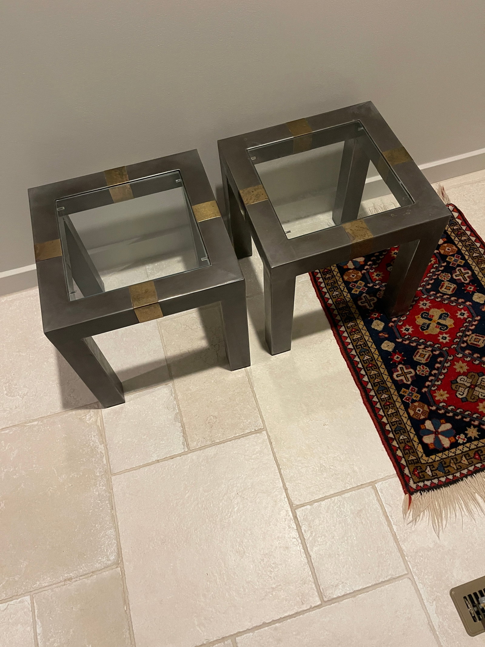 Mid Century Modern Glass top table x2: This is a pair of mid century moden glass top table with metal and brass.