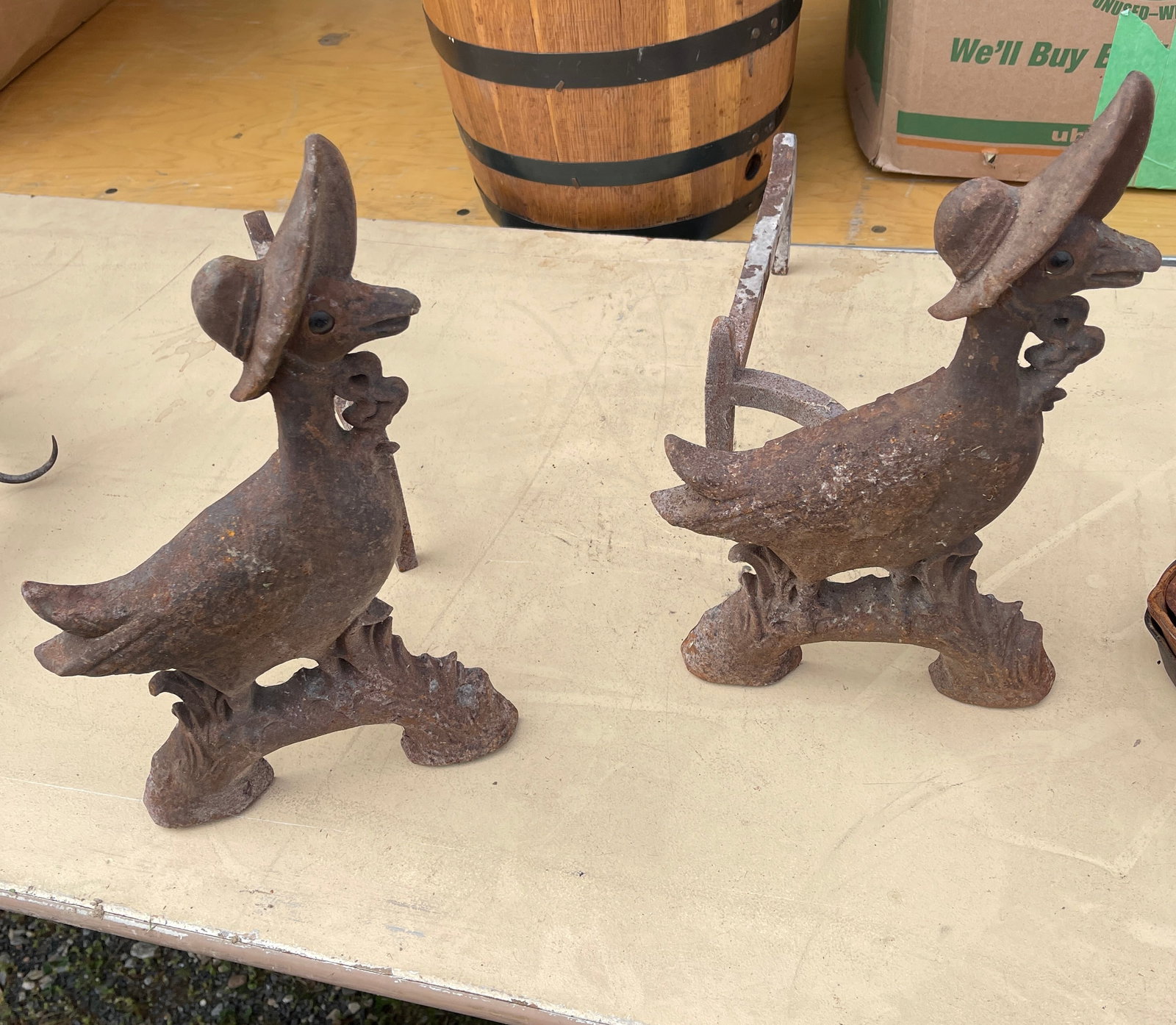 Mother Good Antique Cast Iron Andirons: This lot is a pair of Mother Good Antique Cast Iron Andirons with glass eyes