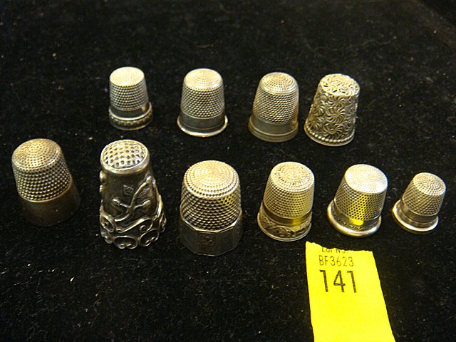 Collection of 10 Estate Sterling Silver Thimbles: Collection of 10 Estate Sterling Silver Thimbles. Some are very ornate, 1 is very small. -CT