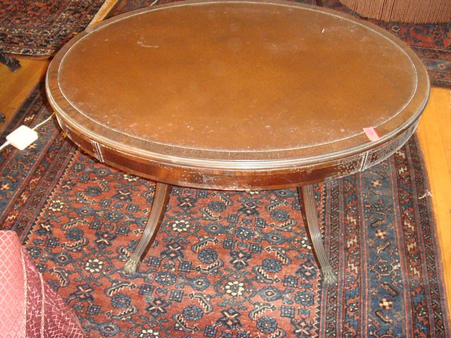 Estate Custom Mahogany Oval Coffee Table: Estate Custom Mahogany Oval Coffee Table. 1940s vintage, "John Stuart Inc." New York and Grand Rapids MI. Measures 34" wide x 24" deep x 20" tall.
