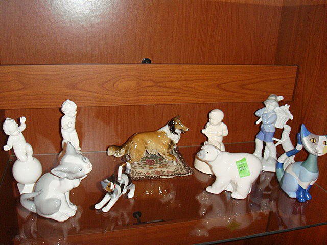 9 Estate Figurines Lot: 2 cats are Goebel, Polar bear and grey and white cat is Lladro, little boy with sheep is German, Collie Dog is German, boy with Lyre and 2 babies on balls are German (one has crack at base).
