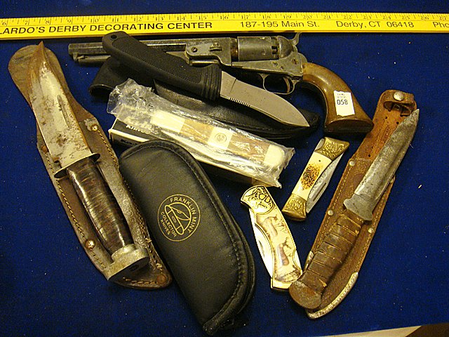 6 Hunting Knives and Model Pistol: 6 Hunting Knives and a model of a pistol. Knives include "F.A. Bower Imp. Co., Germany", "Bridger, 2002 Taiwan", Ka-Bar, Franklin Mint Collector Knives and "Japan" stamped model of pistol.