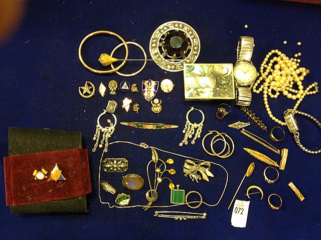 Estate Lot of Jewelry: Estate lot of jewerly, 10kt and 14kt gold ladies pins and rings, and Gruen Ladies Watch, early gold pins dated 1878, Elks pin, etc. and sterling silver ladies pins, one a Lion's Club pin, Man's Watch,