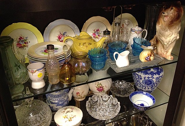 Vintage Estate Lot: Estate Lot Plates, vintage dishware, china pieces, Lassie Dog statue, blue glassware, teapot, glass bell, egg cup, round etched covered candy dish with spire on top, flow blue, and much more! These pi