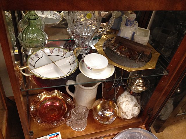 Vintage Estate Lot: Vintage Estate lot including Carnival glass, gold rimmed cake plater, pressed glass, decanters, Aluminumware trays, vintage Corvette model car, pressed glass bowls, Alaskan doll, candle sticks, etc. A