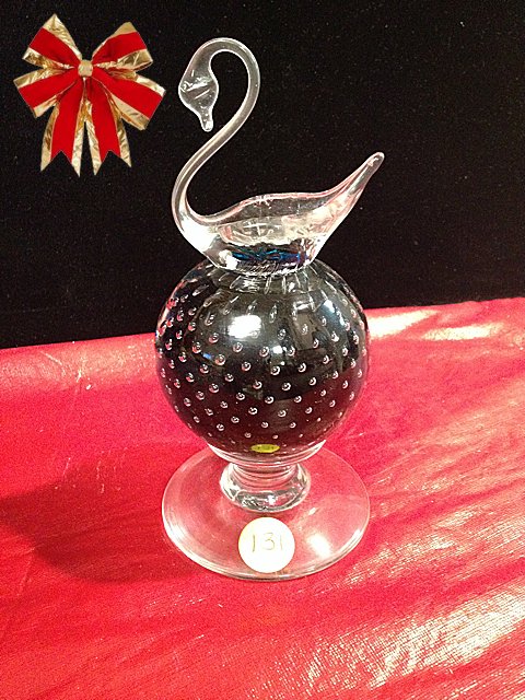 St. Jude Item: Pairpoint Glass Paperweight: To Benefit St. Jude Children's Research Hospital; Pairpoint Glass Paperweight with swan top. Very nice paperweight with black glass and bubbles and swan top by Pairpoint. Measures 7" tall. This lot is