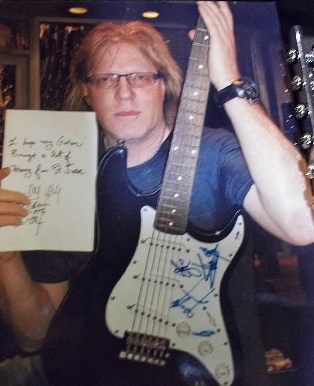 St. Jude Item: Twisted Sister Autographed Guitar: To Benefit St. Jude Children's Research Hospital; This guitar was given to Les Paul in exchange for a "pink" Les Paul signature guitar. Les Paul always loved children and had been a long time supporte