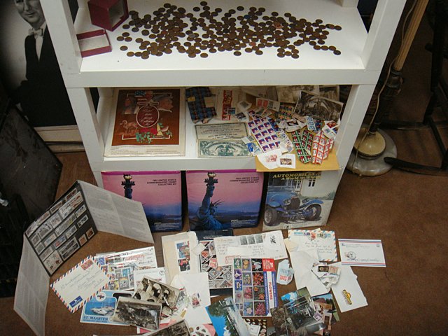 St. Jude Item: Stamp and Coin Collection: To Benefit St. Jude Children's Research Hospital; Stamp collection including commemorative books, foreign and domestic stamps, and pennies including some wheat backs. This lot is being auctioned to be