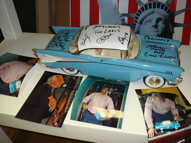 St. Jude Item: Rock N Roll Autographed Decanter: To Benefit St. Jude Children's Research Hospital; 1957 Chevrolet BelAir model car decanter with tail fins autographed by the members of "The Earls" with photos of the band! This car is a decantor and