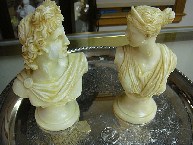 St. Jude Item: Pair of Alabaster Figurines: To Benefit St. Jude Children's Research Hospital; Pair of alabaster Roman figurine, measure approx. 4" wide x 7" high. This lot is being auctioned to benefit St. Jude Children's Research Hospital. We