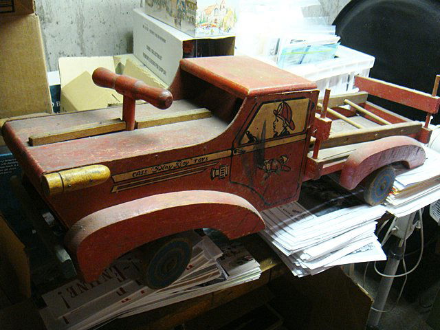 St. Jude Item: Early Child's Ride On Fire Truck: A portion of the proceeds for this item will go to Benefit St. Jude Children's Research Hospital; Vintage fire truck - era of 1930's, all wood for child to sit on and ride, nice with name strill on si