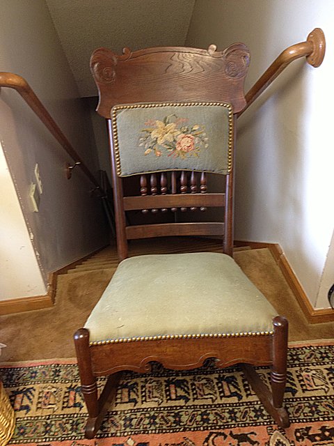 St. Jude Item: Estate Vintage Rocking Chair: To Benefit St. Jude Children's Research Hospital; Estate Vintage rocking chair with needlepint upholstered back, stick and ball design in the middle, appears to be oak and maple. All in nice condition