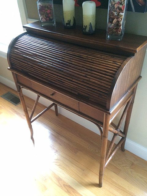 Bamboo and Wood Roll Top Desk: Very nice bamboo and wood roll top desk. Roll top features bamboo with wood desk, pull out writing top, and bamboo legs.