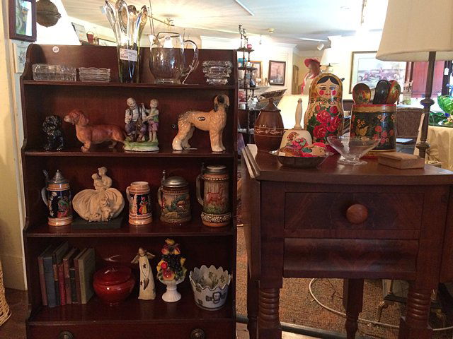 Contents of Bookcase and Table Lot: Contents of Bookcase and Table Lot; Murano glass, silver etched crystal, dog figurines, Lefton figurines, assorted antique books, pottery, steins, Vintage Russian import, Hummel and wooden boxes. Lot