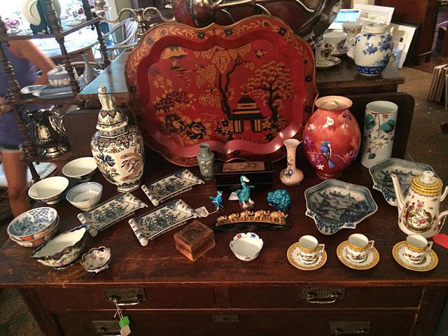 Oriental China Lot: Nippon, Chinese export figurines, bowls, plates, Austrian demetasse set with Asian motif, music box by Westland co. with hummingbird engraving, and painted tray. Covered urn with dog, Japanese ivory e