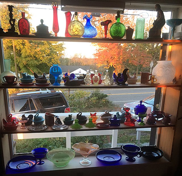Colored Glass Lot: Westmoreland, Boyd, Viking colored glass, hen in baskets, swans and kittens in baskets, decantors, cobalt blue glass, ruby glass, green vaseline glass, amber glass, opalescent, purple, green, chocolat