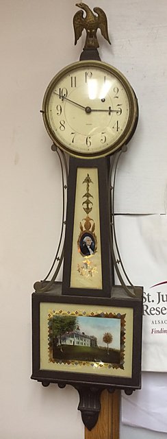 Waltham Banjo Clock: Waltham Banjo Clock. Weight driven, has original eagle top, original throat glass with George Washington, and Mt. Vernon on glass. All original mahogany, all original pendulum and weights, uncommon cl