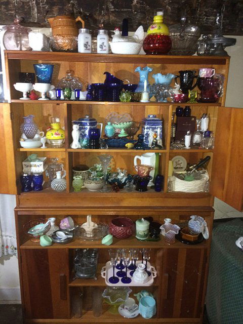 Treasure Trove Lot: Large treasure trove of glassware including cobalt, opalescent, turquoise, milk glass, ruby, vaseline, many Westmoreland pieces and more. Blue willow, vintage and decorative items, covered jars, cruet