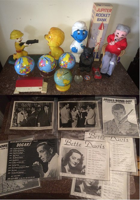 Vintage Banks and Movie Memorabilia: 10 Vintage Banks, including cast iron house & bear, U.S. Army Rocket Bank, globe banks, Smurf Bank, Hunter and Lion Bank, doll, plus movie memorabilia including Bogart, Bette Davis, James Bond, etc.