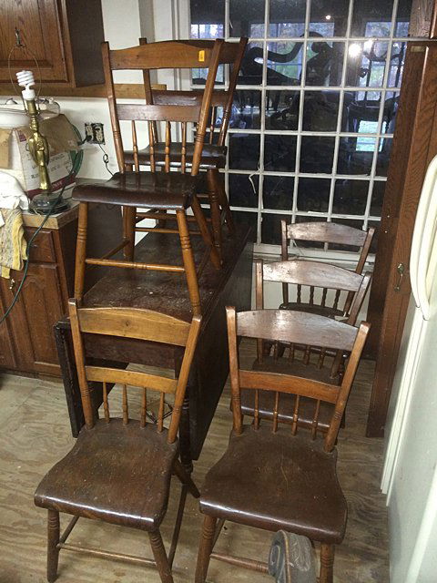 Drop Leaf Table: Drop leaf table with 6 matching chairs.
