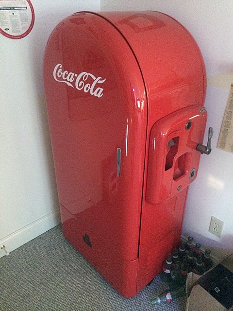 Vintage Coca Cola Machine: Vintage Coca Cola vending machine dating from the mid 1940's, mailbox style by F.L. Jacobs Co., Indianapolis, Indiana. Jacobs was one of the few manufacturers allowed to produce new vending machines d