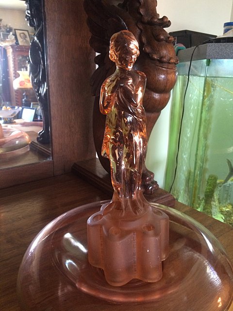 Vintage Bashful Charlotte Flower Frog: Pink glass flower frog referred to as "Bashful Charlotte" or "Draped Lady", with pink Depression glass bowl with gold rim. Flower frog measures 13 1/4" tall x 5" wide at base with vertical ribs to hol