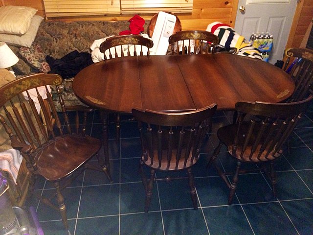 Hitchcock Dining Set: Maple harwood Hitchcock dining set with 6 chairs (one arm chair, 5 side chairs), hutch with curio top, 4 drawers, 2 doors, and rocking chair. Owner's original lpaid over $3,500 for set. This set has t
