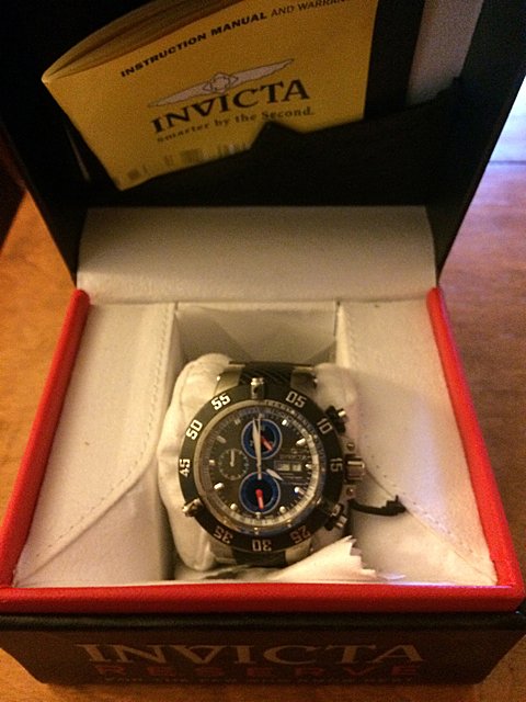 Invicta Men's Watch: Invicta men's diving watch in original box with paperwork. Family has watch valued at $700.