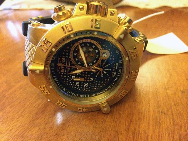 Invicta Men's Watch: Invicta men's diving watch. Family has watch value at $400